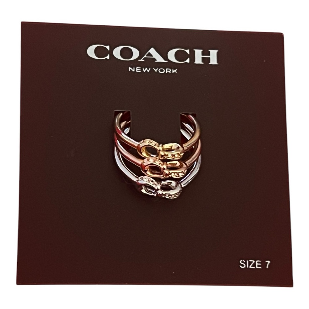Coach NWT gorgeous set of three interlock pave signature C ring set in 3 tones.